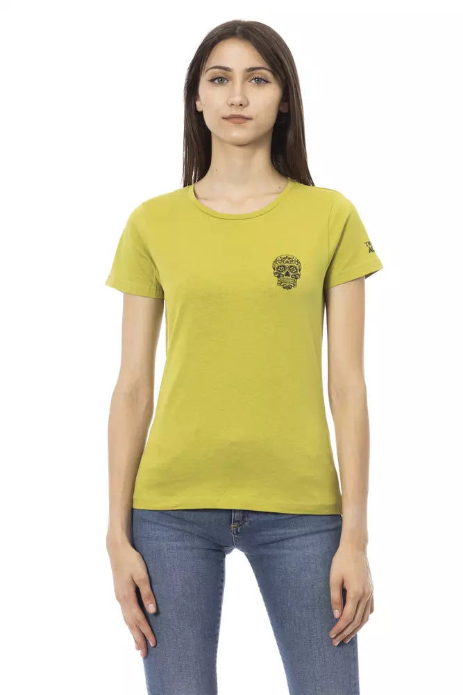 Green cotton women's t-shirt with short sleeves and a small black skull graphic on the chest