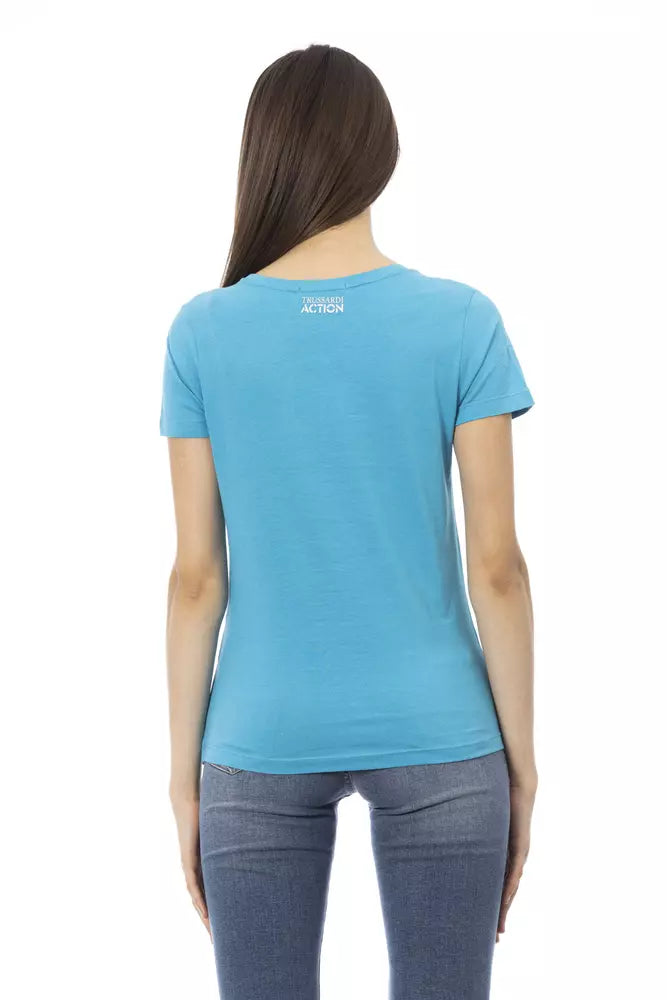 Light blue cotton women t-shirt with short sleeves worn by a model from behind