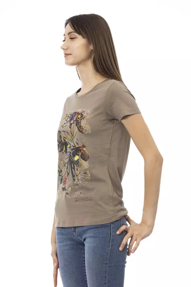 Brown cotton women t-shirt with floral graphic print on the front worn with blue jeans