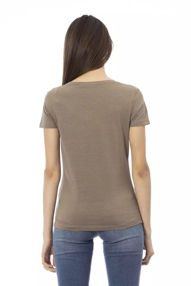 Rear view of a woman wearing a brown cotton t-shirt and blue jeans