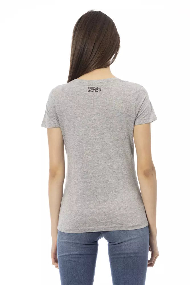 Gray cotton women t-shirt viewed from the back with a small black brand logo on the upper back