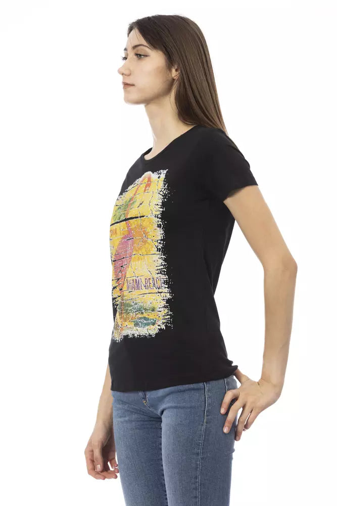 Black cotton women t-shirt with graphic print and short sleeves worn with blue jeans