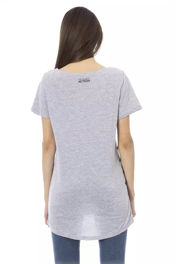 Gray cotton women t-shirt viewed from behind with a small black brand logo on the upper back
