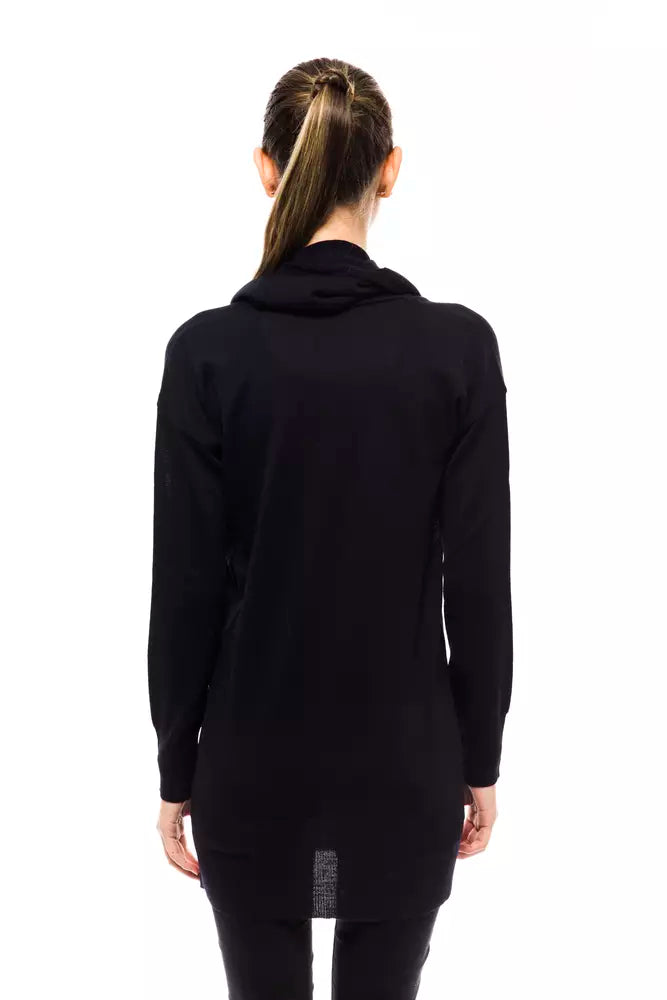 Back view of a woman wearing a dark blue, long-sleeved knit wool sweater with a cowl neck