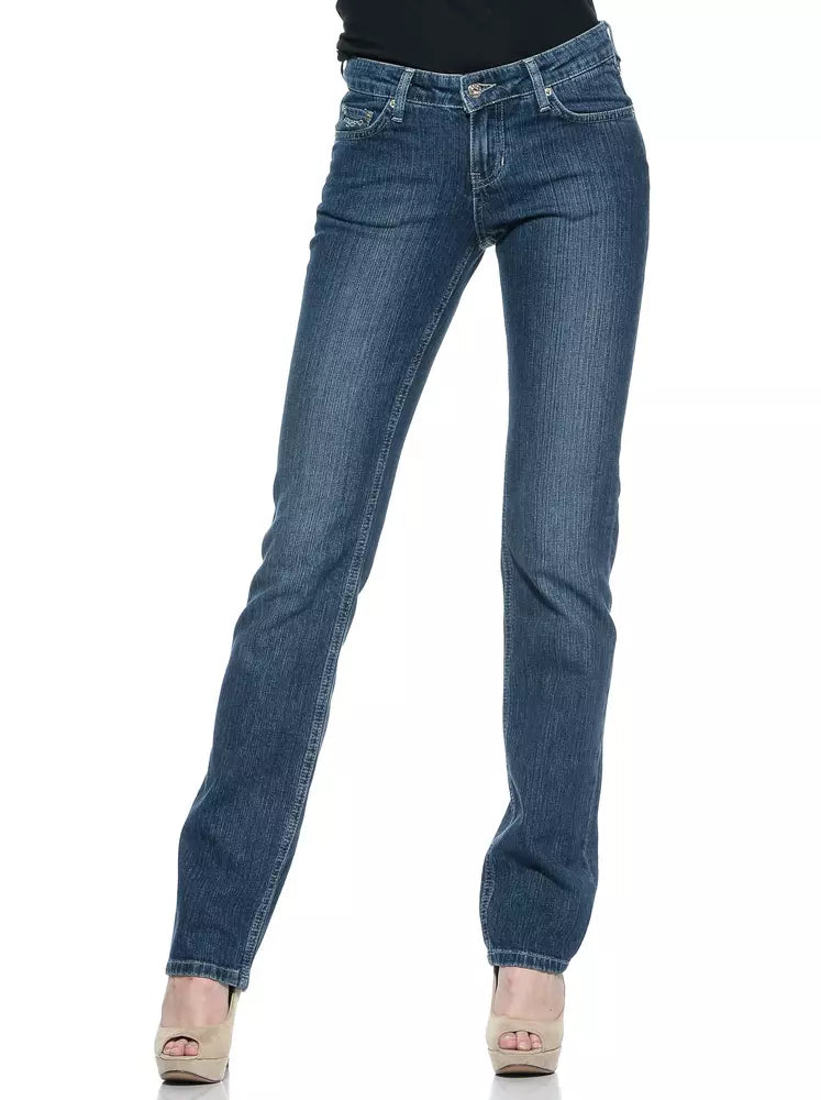 Blue cotton women's straight-leg denim jeans worn with a black top and beige platform heels