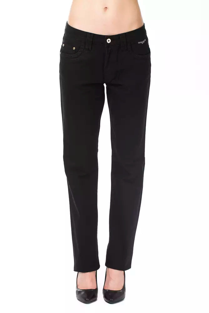Black cotton straight-leg women's pants worn on a person with heels