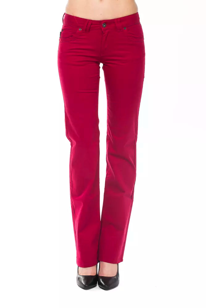 Vibrant red cotton women's trousers in a slim, straight-leg style with a mid-rise waist and classic pockets