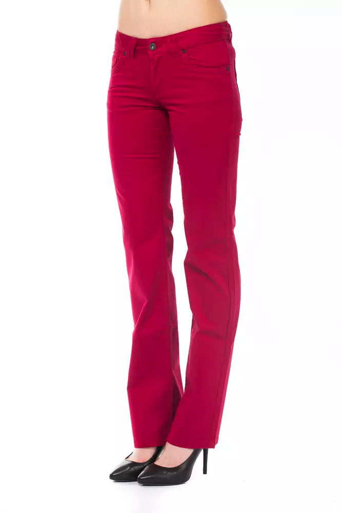Red cotton women's straight-leg pants with a button closure worn with black heels