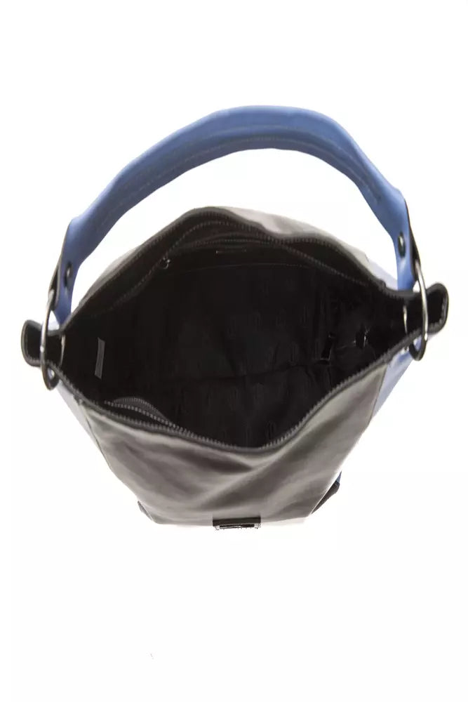 Top-down view of black leather women shoulder bag with blue handle and black lining interior