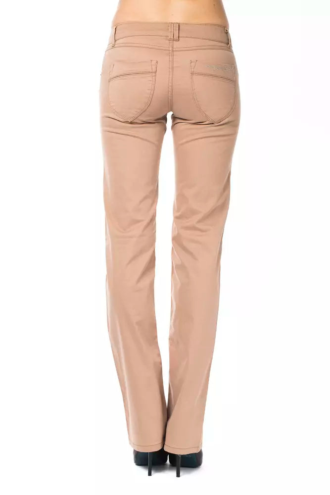 Beige cotton women's jeans seen from the back, showing a fitted straight-leg style with back pockets