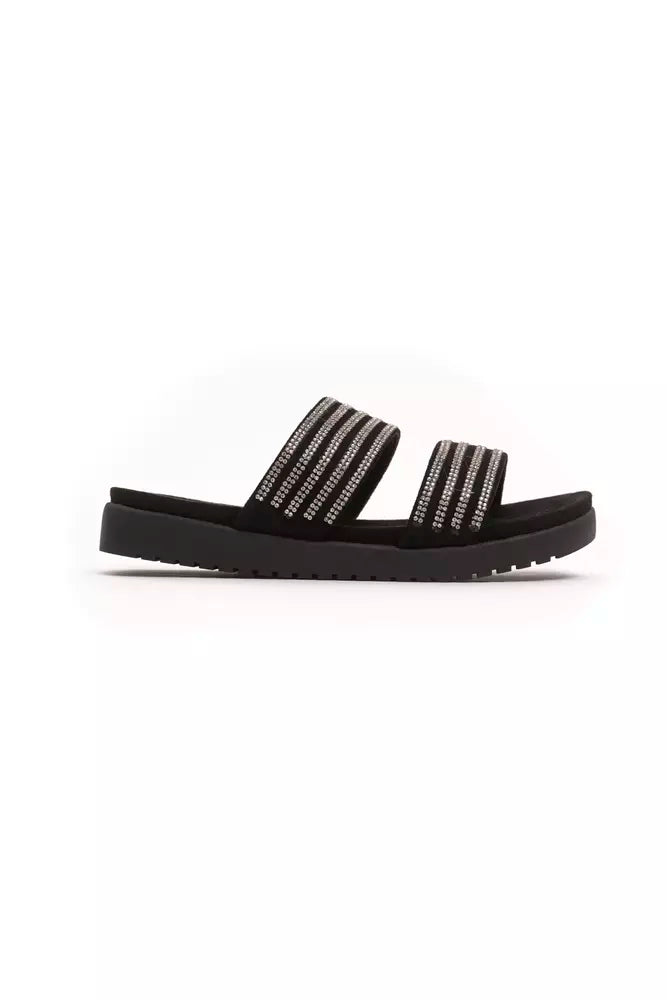 Black textile slide sandal with two wide straps adorned with rows of shimmering silver rhinestones and a lug sole.