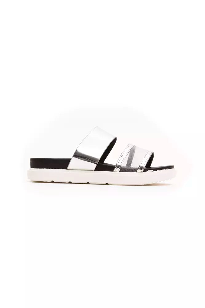 Silver metallic polyethylene double-strap women’s slide sandal on a black footbed with a thick white platform sole.