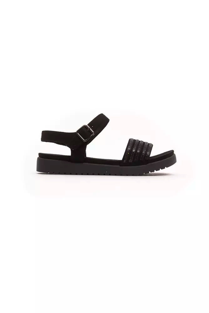 Black textile women's sandal with a buckle ankle strap, embellished front strap, and chunky lugged sole.