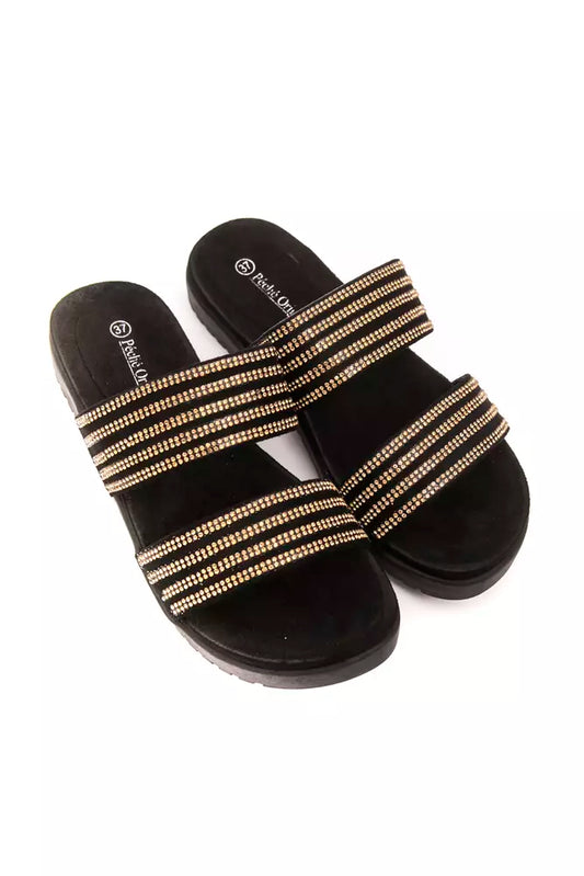 Black textile double-strap slide sandals with horizontal gold rhinestone embellishments on each strap.