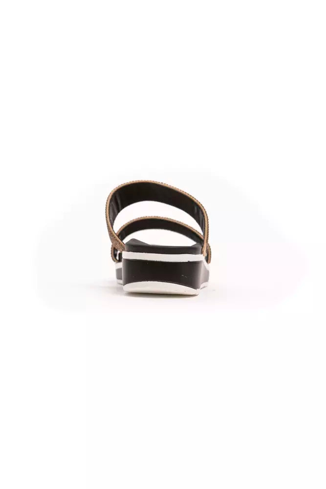 Péché Originel beige textile slide sandal with two straps and a chunky black and white platform sole.
