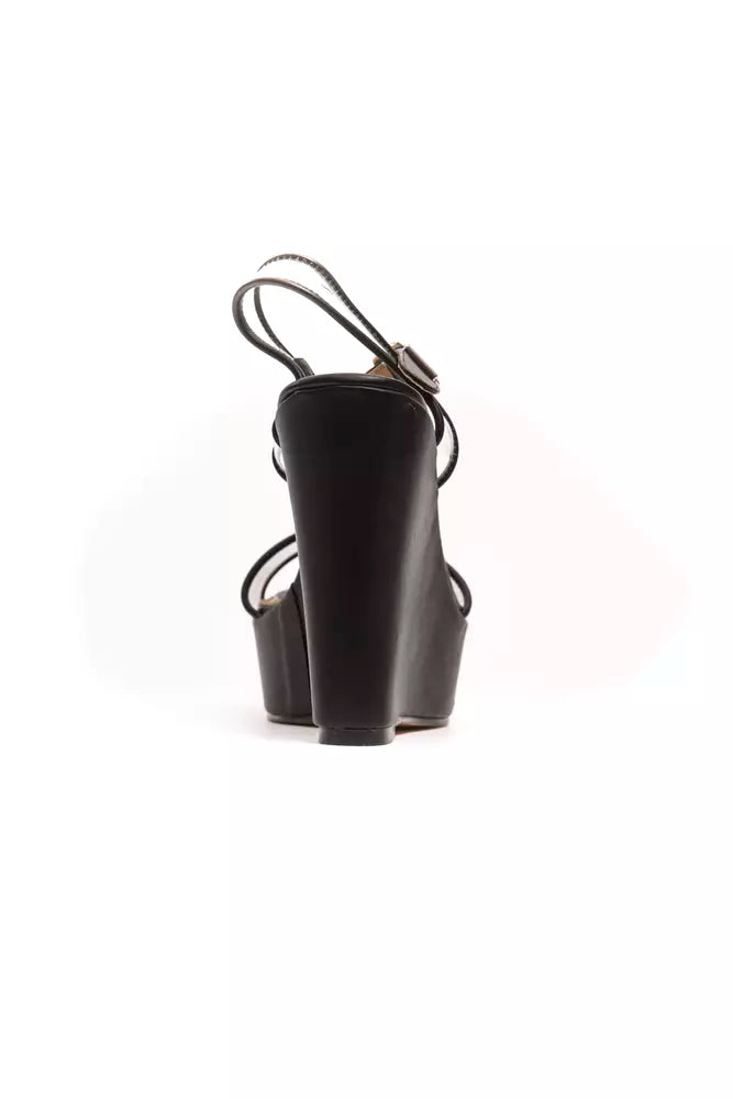 Black polyethylene women’s platform wedge sandal with a sleek, minimalist strappy design and buckle closure.