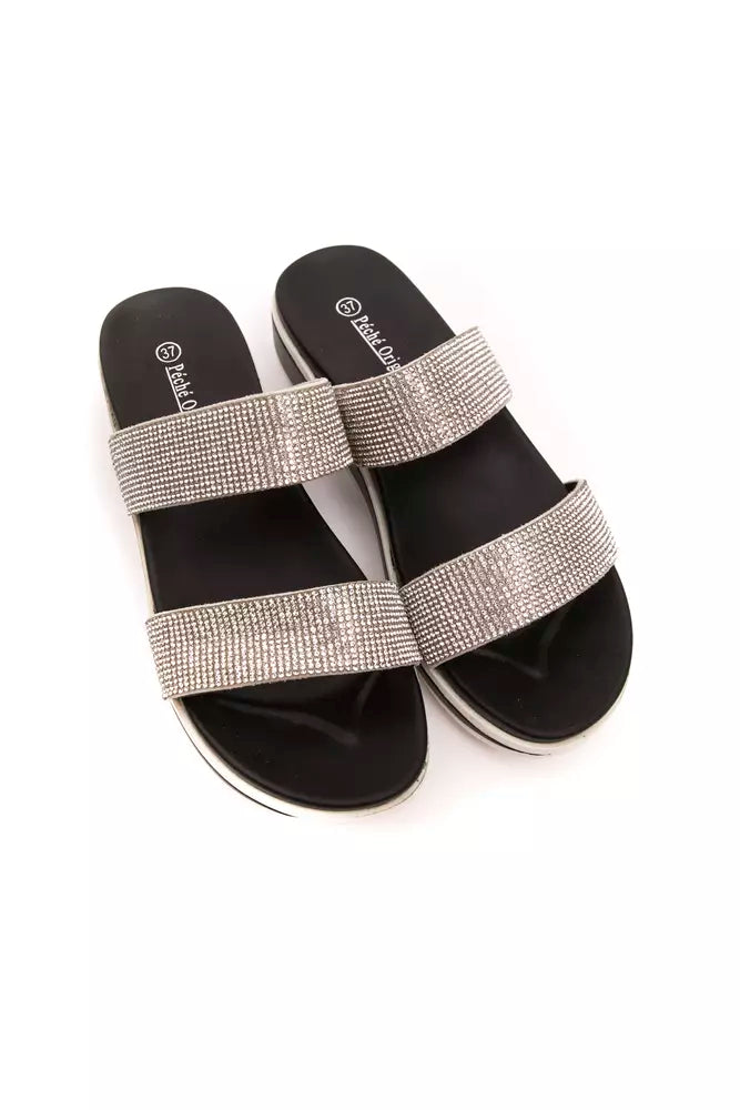 Péché Originel silver rhinestone textile double-strap slide sandals with black footbeds and white platform soles.