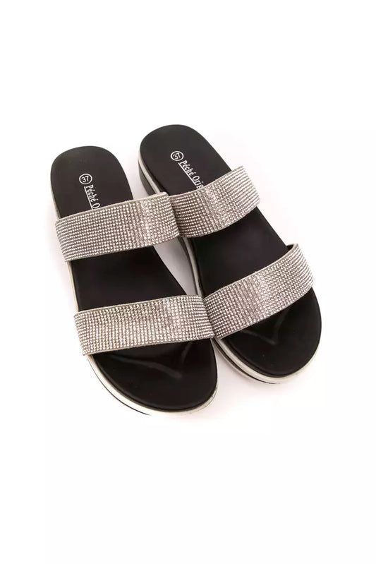 Péché Originel silver rhinestone textile double-strap slide sandals with black footbeds and white platform soles.