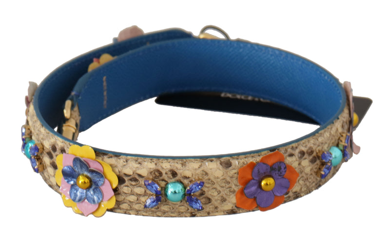Beige python leather shoulder strap decorated with colorful floral studs and blue interior