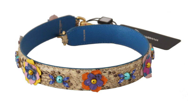 Beige python leather shoulder strap with colorful floral studs and a blue lining