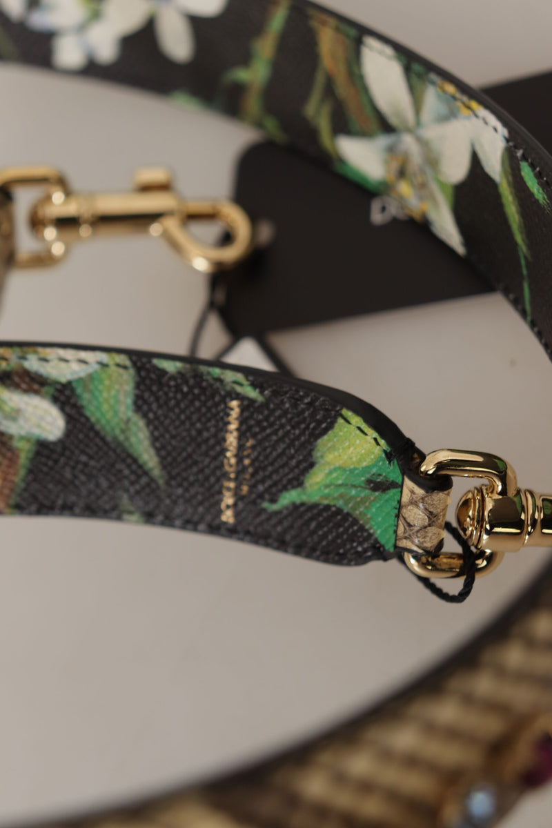 Black floral leather shoulder strap with gold hardware and exotic leather detail