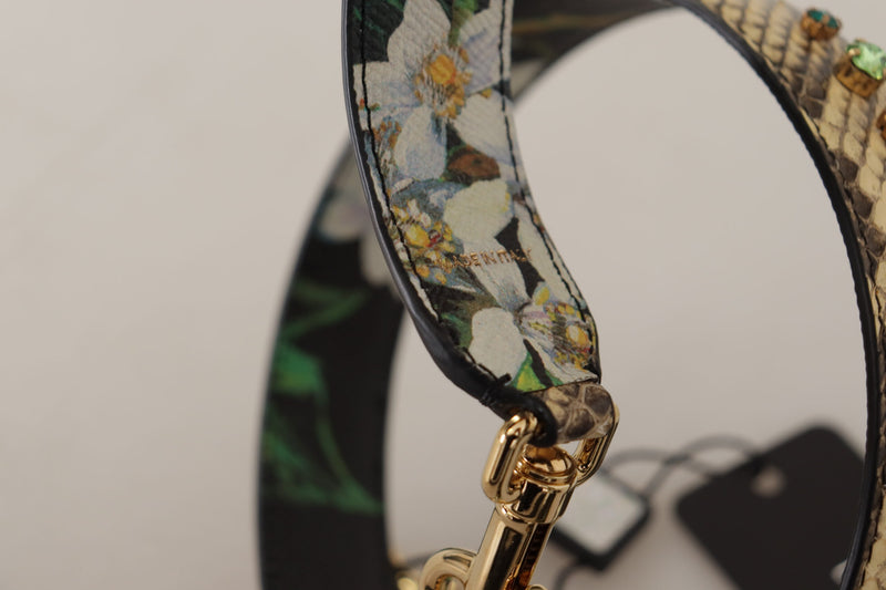 Reversible black floral and beige snakeskin shoulder strap with crystal embellishments and gold hardware