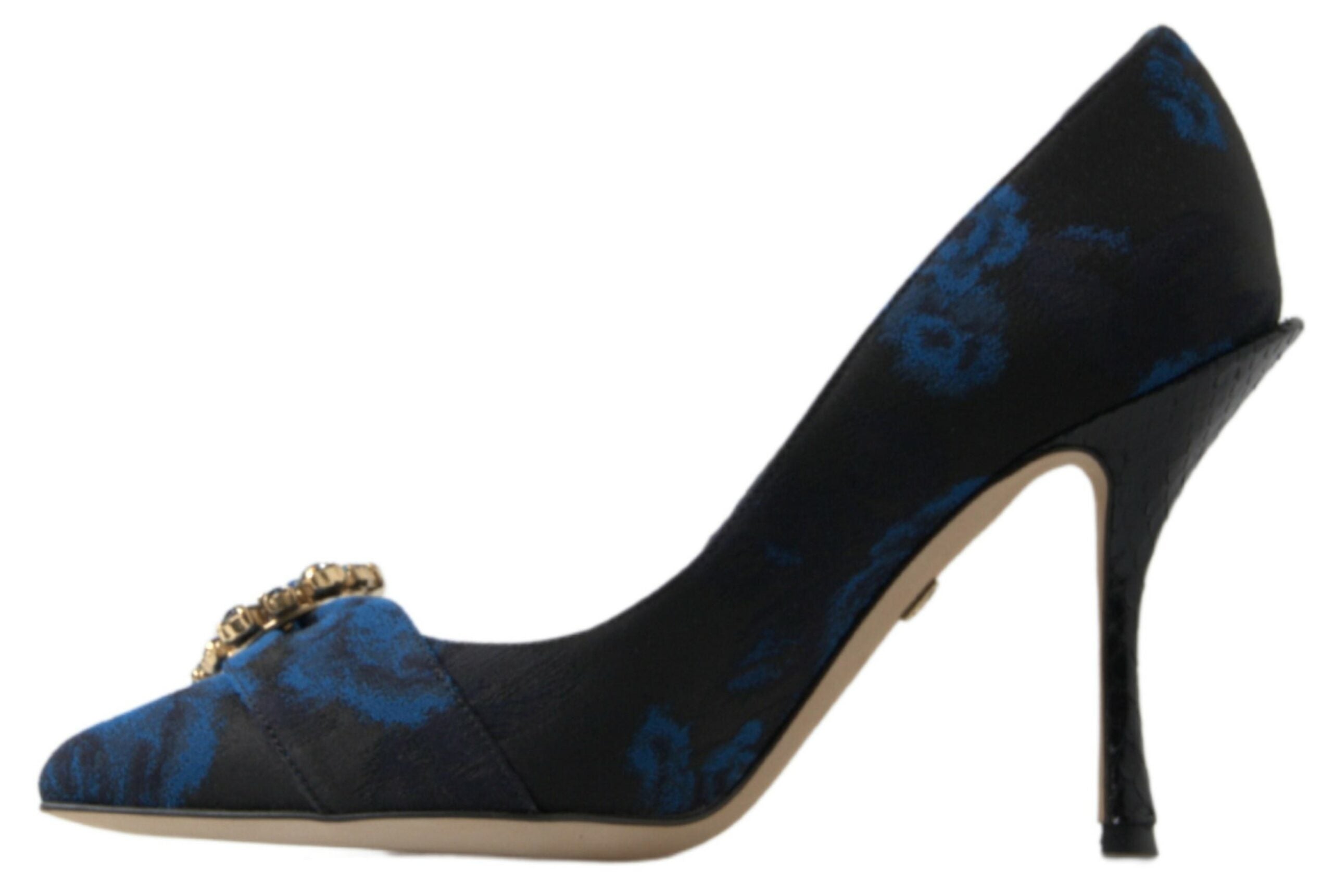 Dolce & Gabbana black pump with blue floral pattern, pointed toe, crystal embellishment, and textured stiletto heel.