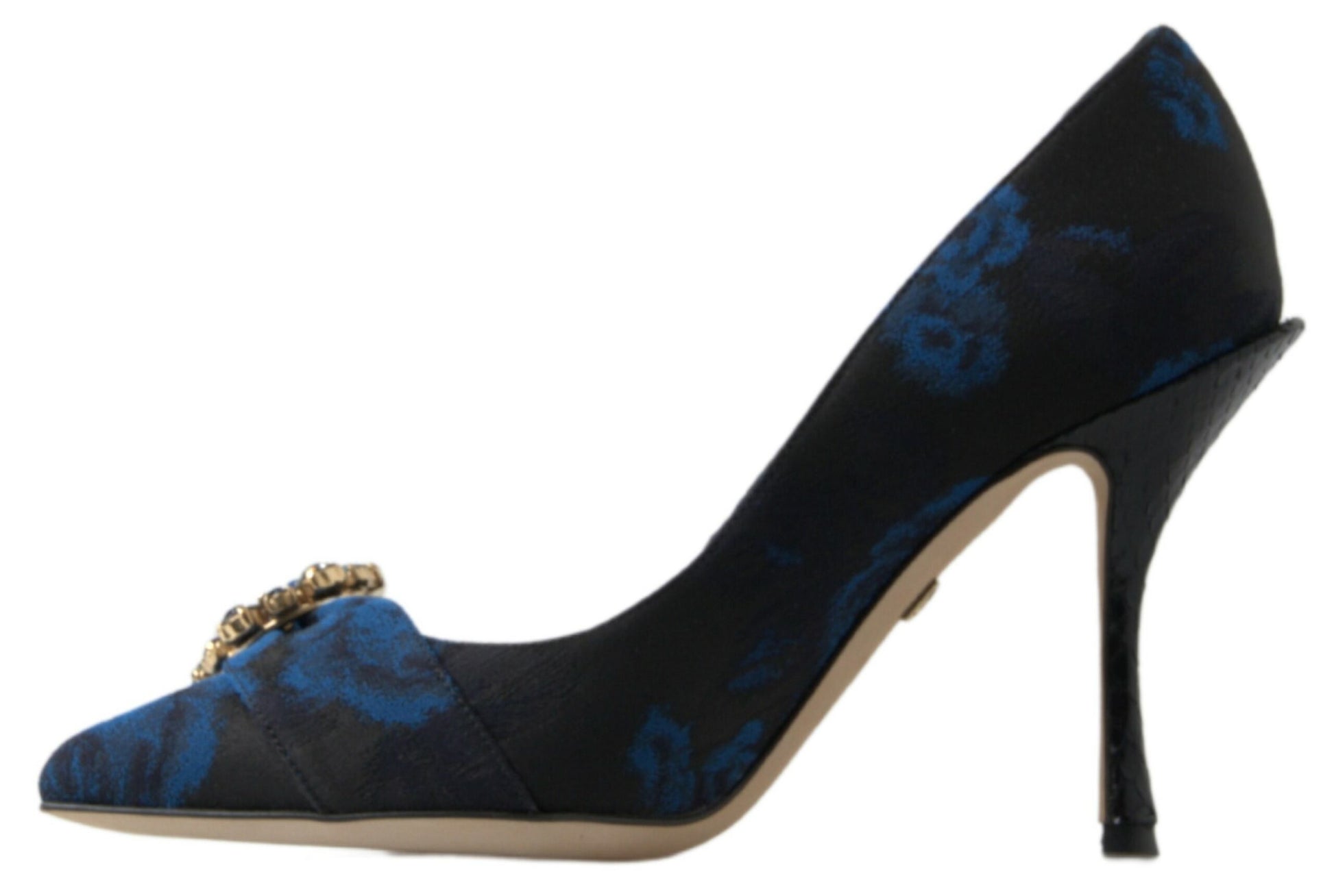 Dolce & Gabbana black pump with blue floral pattern, pointed toe, crystal embellishment, and textured stiletto heel.