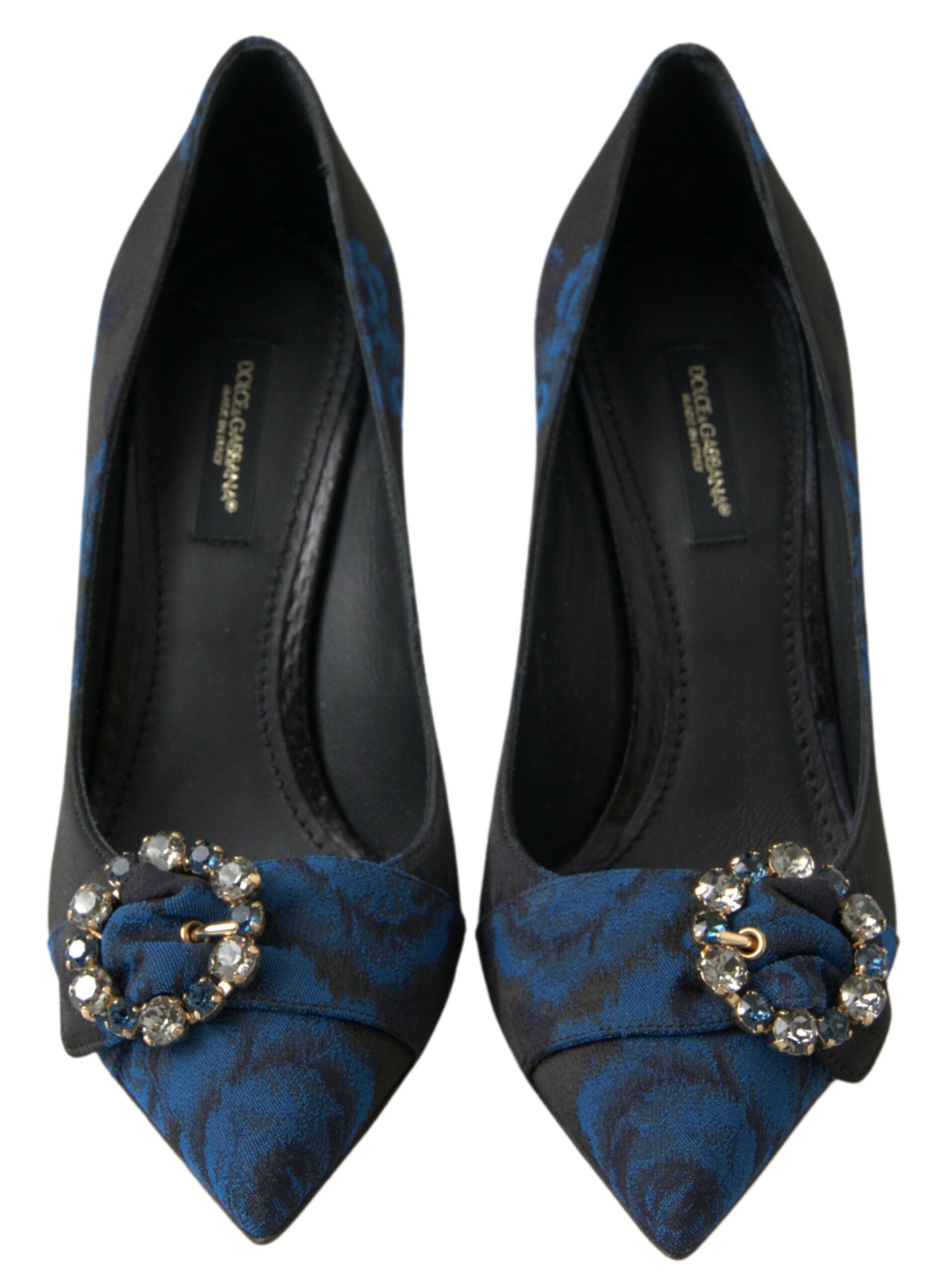 Dolce & Gabbana pointed-toe pumps in black and blue floral brocade, featuring a sparkling crystal buckle detail.