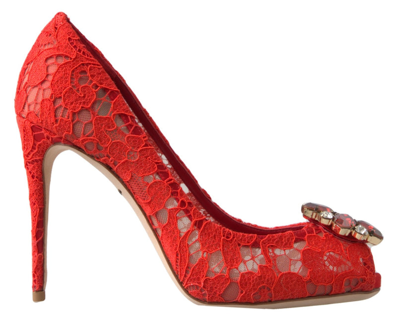 Red lace stiletto pump with a pointed toe, featuring an embellished crystal buckle on the front.