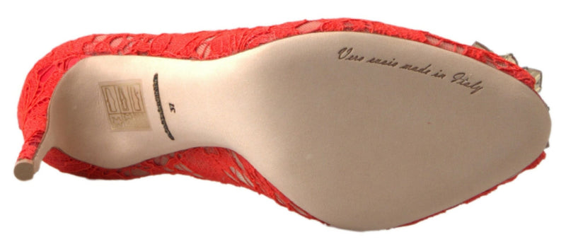 Bottom view of a red Taormina lace Dolce & Gabbana stiletto pump with a beige leather sole, size 37.