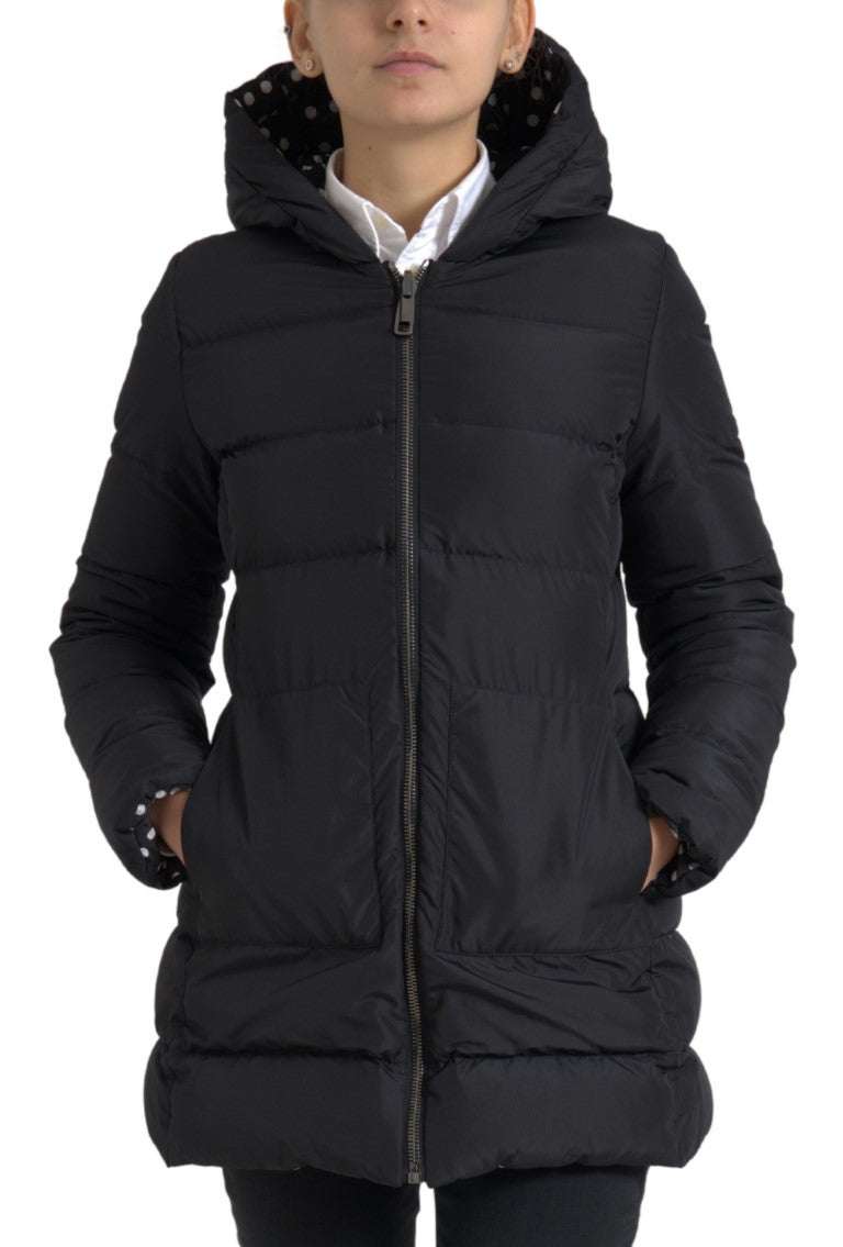 Black polyester reversible hooded jacket with a white polka dot lining