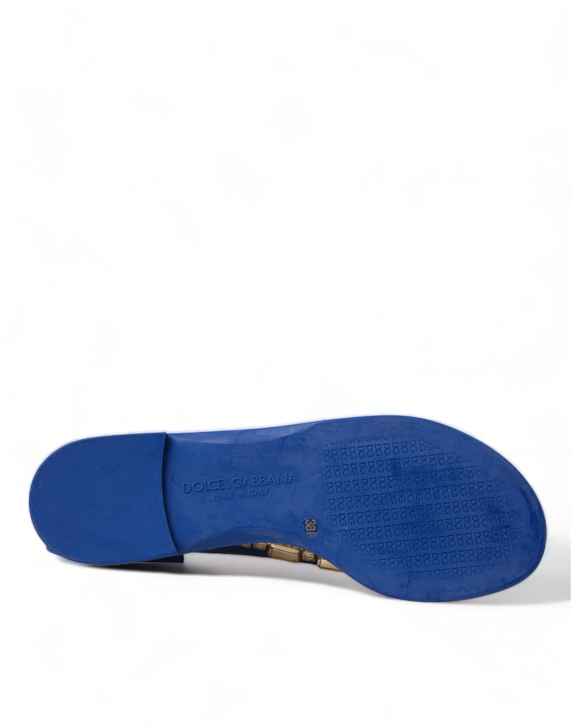 Blue Dolce & Gabbana flat sandal sole with embossed DG logo pattern and "Made in Italy" text.