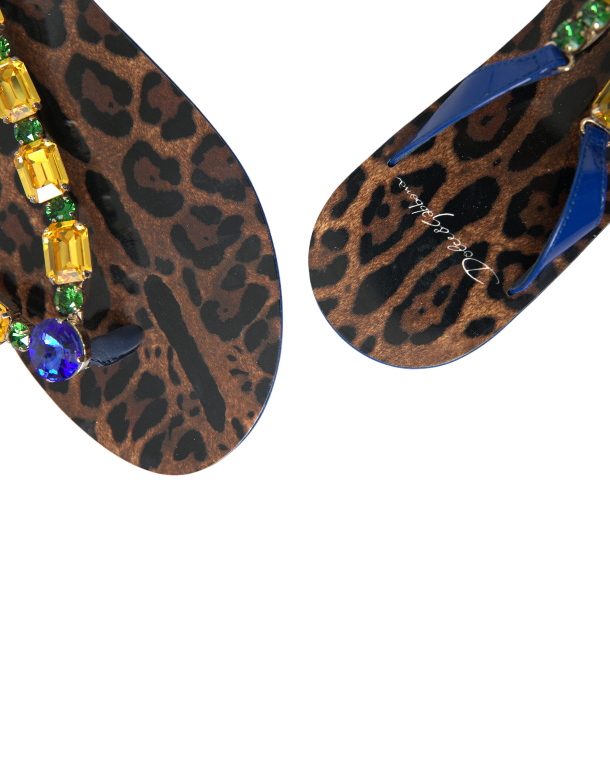 Dolce & Gabbana thong sandals featuring leopard print, blue straps, and multi-colored crystal embellishments.