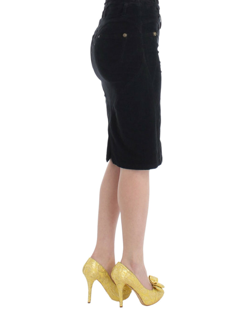 Black corduroy pencil skirt in a fitted knee-length style