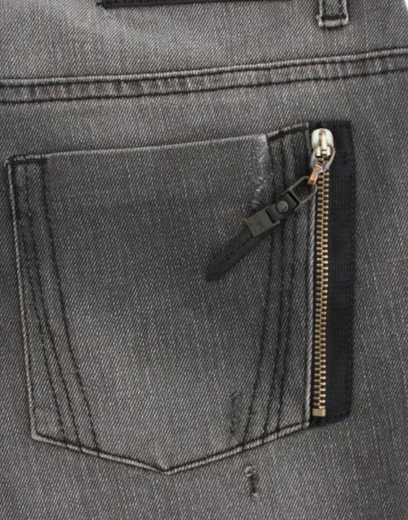 Gray denim jeans featuring a back pocket with a zipper closure and black trim