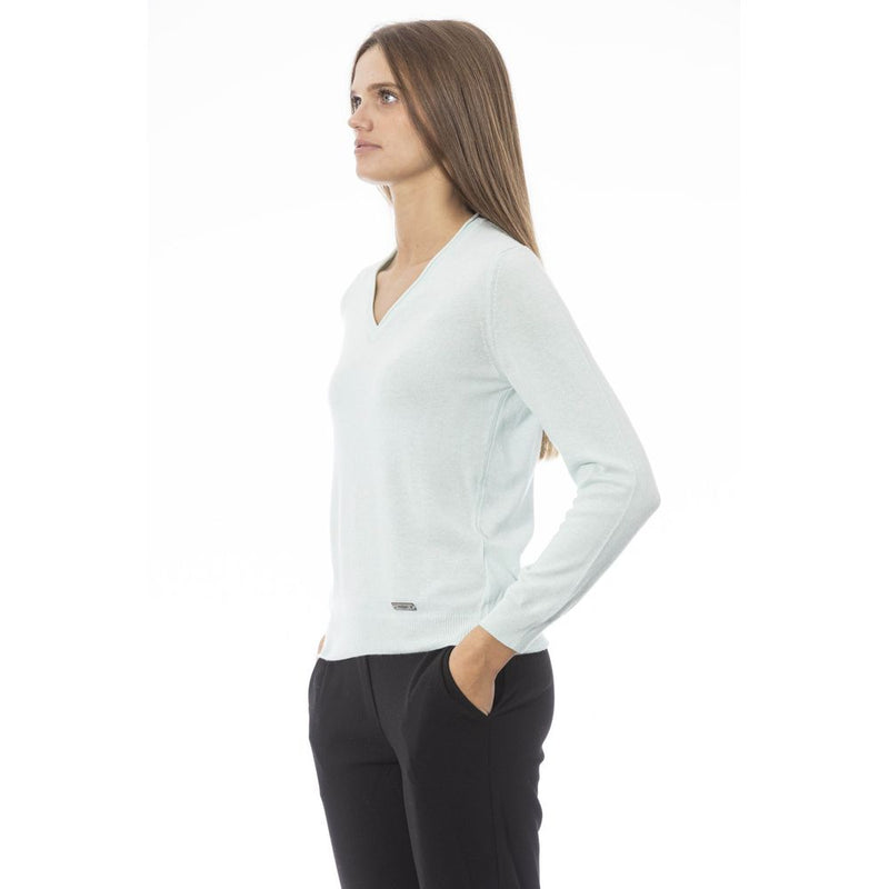 Light blue cashmere v-neck women sweater with long sleeves worn by a model