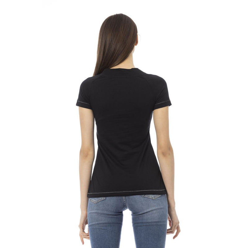 Rear view of a woman wearing a plain black cotton t-shirt with short sleeves