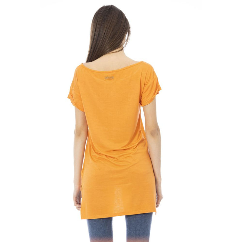 Orange cotton women t-shirt with short sleeves worn from behind