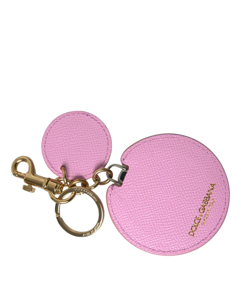 Pink textured leather keychain with gold metal hardware and logo print