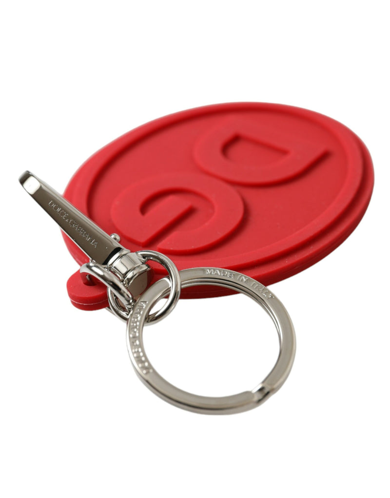 Red rubber keychain with a silver brass metal ring and lobster clasp, featuring a debossed DG logo