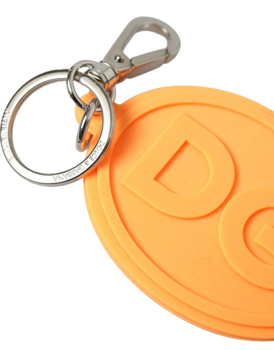 Orange rubber oval keyring with raised DG logo and silver metal clasp