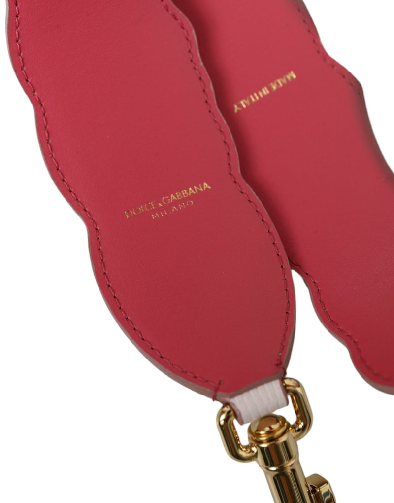 Pink scalloped leather shoulder strap with gold hardware and logo