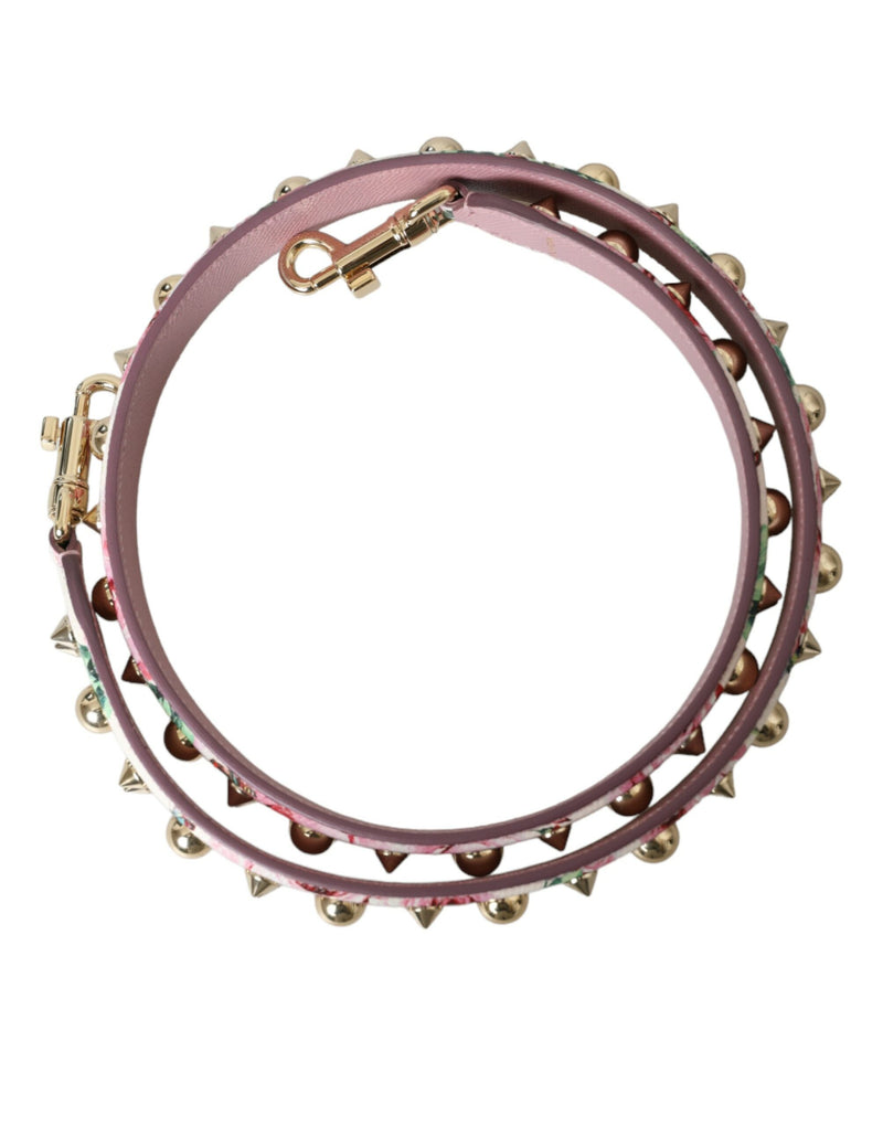 Coiled pink leather handbag shoulder strap with floral print and gold studs