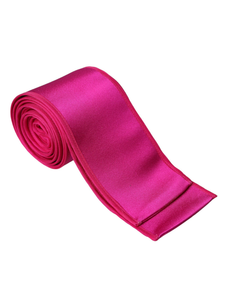 Fuchsia pink silk waist belt rolled neatly with a glossy finish