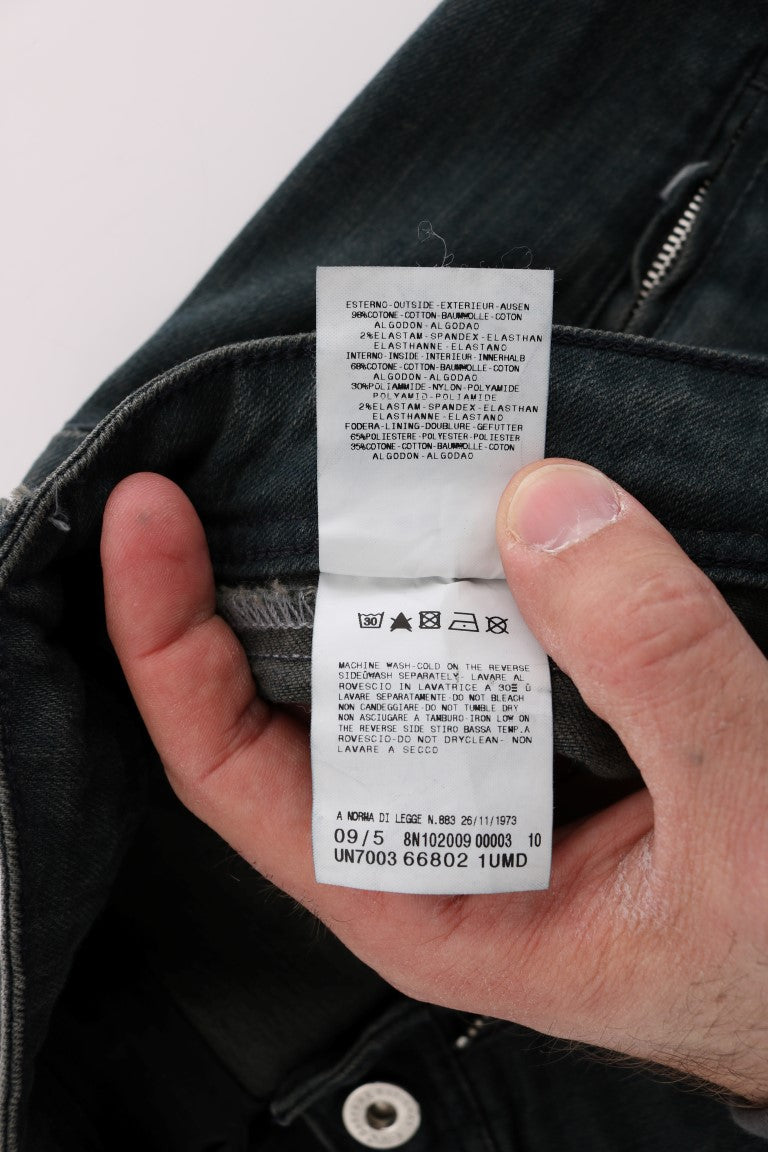 Gray cotton denim jeans with care label showing fabric composition