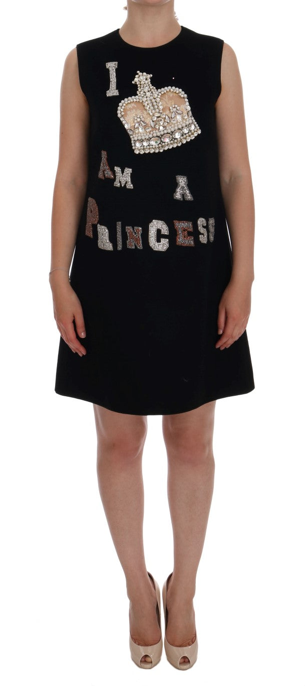 Black sleeveless shift dress with crystal crown graphic and text