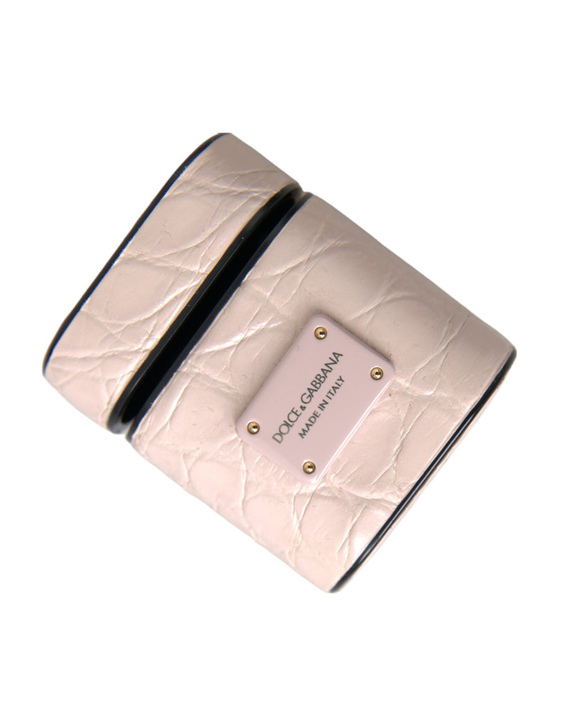 Light pink embossed leather AirPods case with a Dolce & Gabbana logo plaque