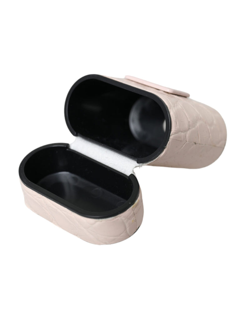 Light pink textured leather AirPods case opened with a black interior