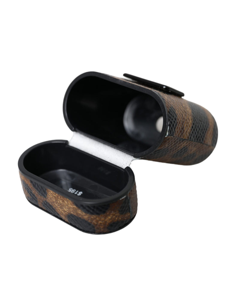 Open brown leopard print leather AirPods case with black interior and metal plaque on back